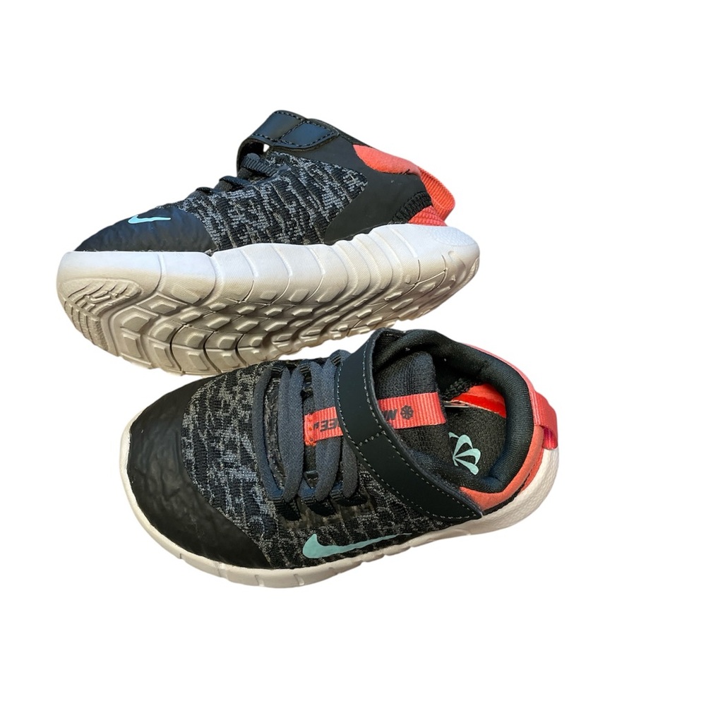 Nike Kids Black and White Sneakers with Orange Accents. - Picture 3 of 6